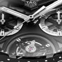 Close-up of the TAG Heuer Carrera Tourbillon Ceramic watch face, showcasing the brand logo, chronograph subdials, and its eye-catching tourbillon chronograph mechanism.