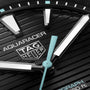 Close-up of the TAG Heuer Aquaracer Professional 200 Solargraph watch face, showcasing the logo, hands, hour markers, textured black dial, and its innovative solar-powered Solargraph module.
