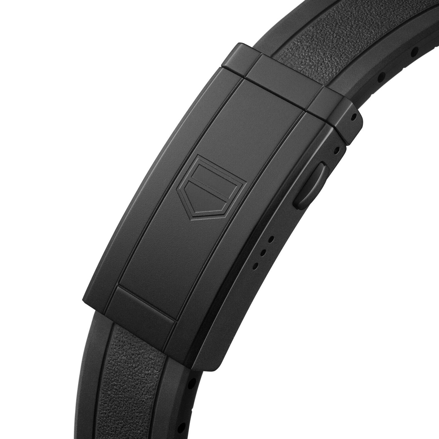 Close-up of a black clasp with geometric logo on a textured strap, attached to the TAG Heuer Aquaracer Professional 200 Solargraph featuring an advanced solar-powered module.