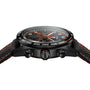 Side view of the TAG Heuer Special Edition Carrera Chronograph x Porsche Orange Racing watch in black, showcasing orange accents, a textured strap, and prominent control buttons.