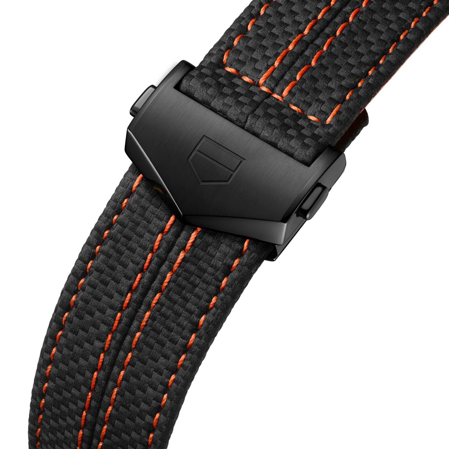 Close-up of the TAG Heuer Carrera Chronograph x Porsche Orange Racings black woven strap with orange stitching, matte black clasp with shield logo, and refined details inspired by this special edition.