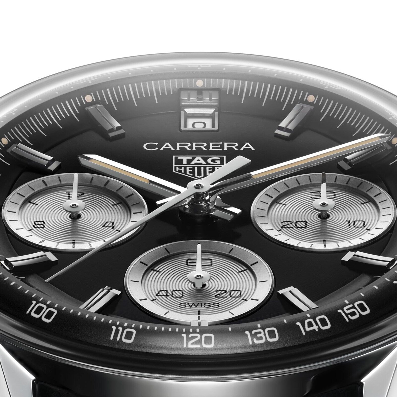 Close-up of a TAG Heuer Carrera Chronograph watch face with three subdials, silver markers, a black tachymeter bezel, and a sleek black leather strap.