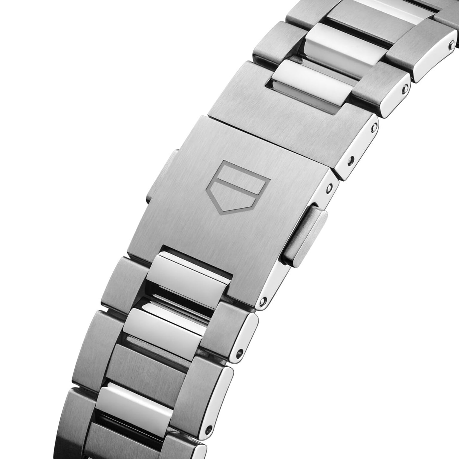 Close-up of the TAG Heuer Carrera Dates stainless steel bracelet, featuring a clasp engraved with the iconic shield logo—a testament to endurance and refined automatic movement.