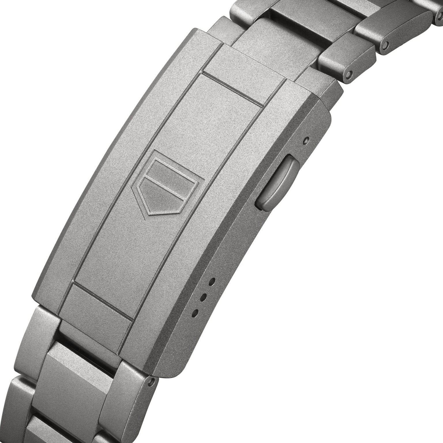 Close-up of a TAG Heuer Aquaracer Professional 200 Solargraph bracelet clasp, showing the geometric logo and push button release mechanism.