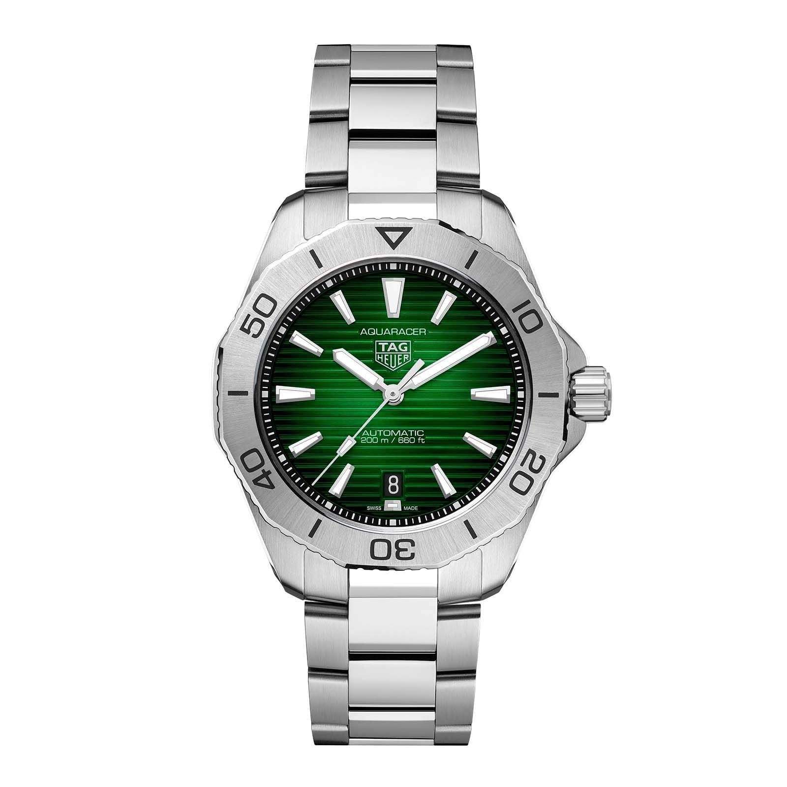 The TAG Heuer Aquaracer Professional 200 is a stainless steel sports watch featuring a green dial, silver hour markers, and a date window at 6 oclock, shown against a white background.