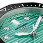 Close-up of a TAG Heuer Aquaracer Professional 300 Date watch face featuring a green textured dial, silver hands, and diamond hour markers.