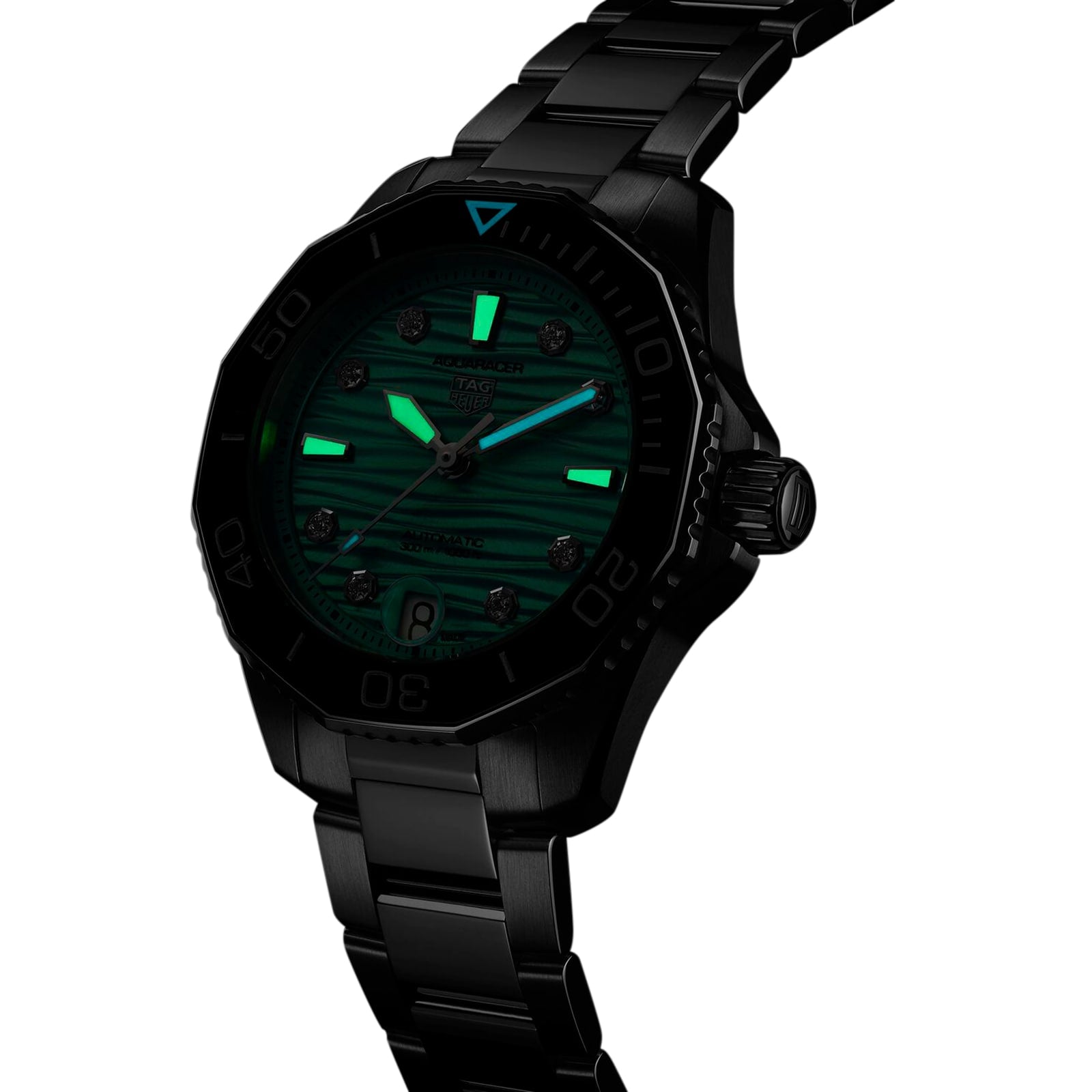 The TAG Heuer Aquaracer Professional 300 Date sports watch features a dark green glowing dial with luminescent hands and markers and a rotating bezel, elegantly displayed at an angle against a white background.