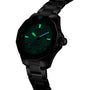 The TAG Heuer Aquaracer Professional 300 Date sports watch features a dark green glowing dial with luminescent hands and markers and a rotating bezel, elegantly displayed at an angle against a white background.
