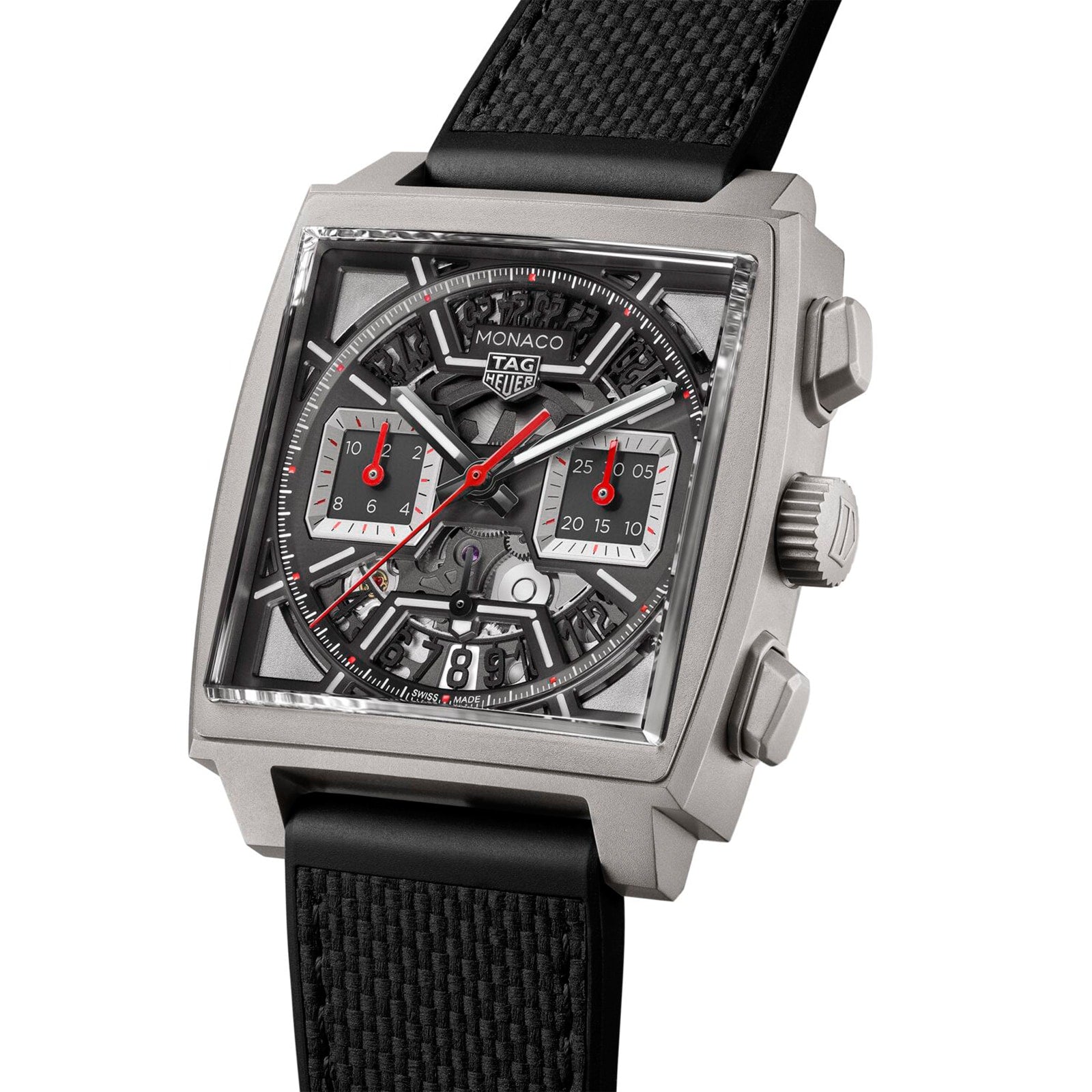 The TAG Heuer Monaco Chronograph features a square face, skeleton dial, black strap, and stainless steel case with the Heuer 02 movement and advanced chronograph functions.