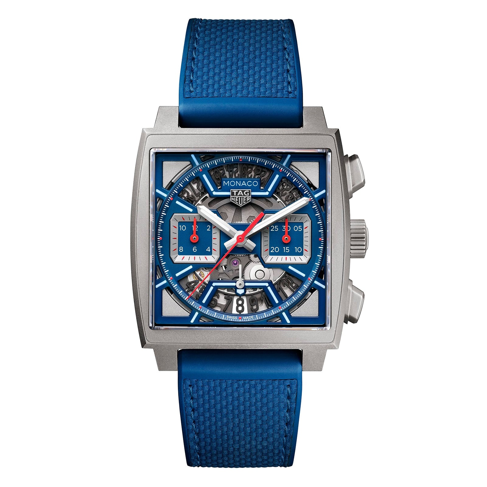 The TAG Heuer Monaco Chronograph features a square case, skeleton dial, calibre Heuer 02 movement, blue strap, and bold red accents on the hands and subdials.