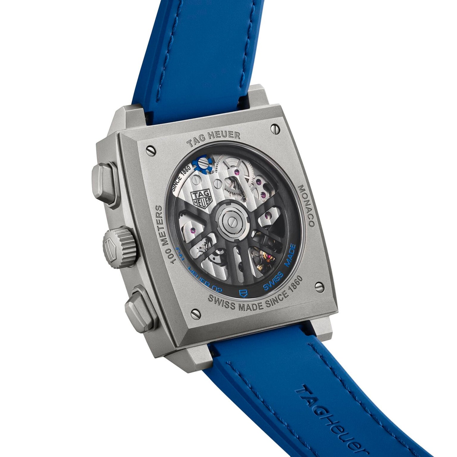 Back view of the TAG Heuer Monaco Chronograph, featuring a blue strap and displaying its automatic movement through a transparent case back.