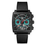 The TAG Heuer Monaco Chronograph is a square black wristwatch with visible gears, turquoise and red accents, and a black textured strap.
