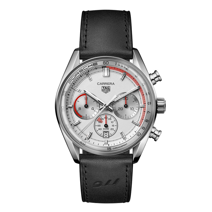 The TAG Heuer Special Edition Carrera Chronosprint x Porsche watch features a white dial, black subdials, red accents, and a black leather strap, inspired by the Porsche 911’s racing spirit and precision.