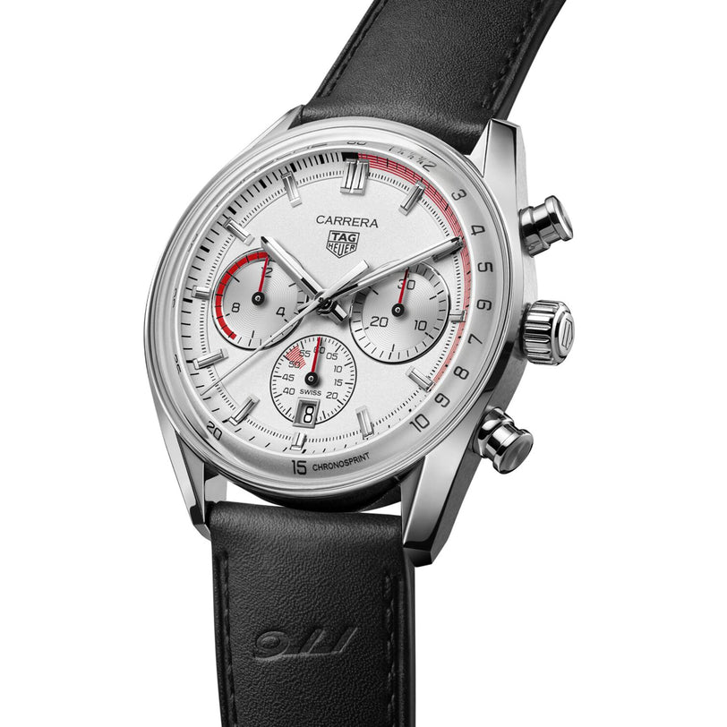 A TAG Heuer Special Edition Carrera Chronosprint x Porsche chronograph watch in silver with a black leather strap and three subdials.