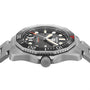 A close-up side view of the gray TAG Heuer Limited Edition 1 of 500 Aquaracer Professional 300 dive watch with a black rotating bezel, black dial, and metal bracelet highlights its luxury tool watch allure.