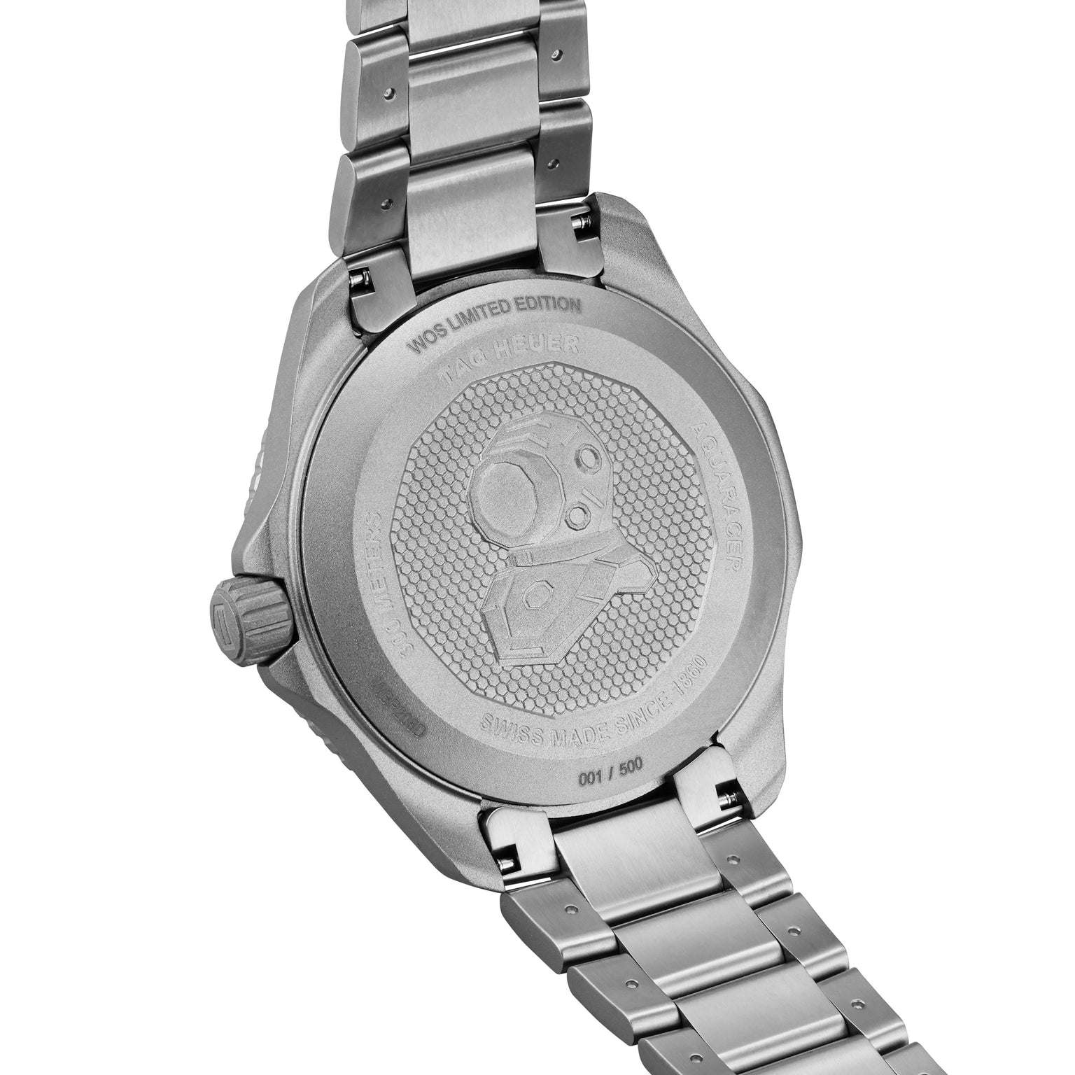 Back of the TAG Heuer Limited Edition 1 of 500 Aquaracer Professional 300, showing engraved helmet design, WOS LIMITED EDITION marking, Calibre 5 automatic movement detail, and serial number 001/500.