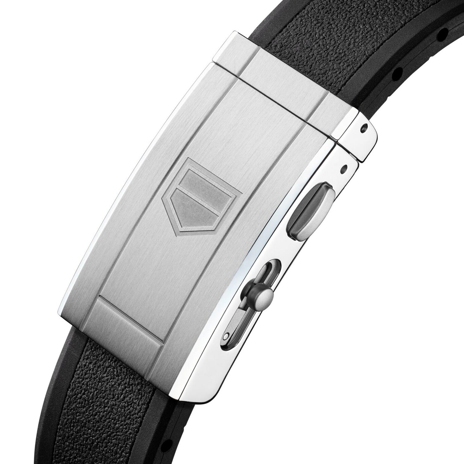 Close-up of a stainless steel deployment clasp with the TAG Heuer logo, paired with a black textured rubber strap—showcasing the craftsmanship of the TAG Heuer Aquaracer Professional 300 Date.