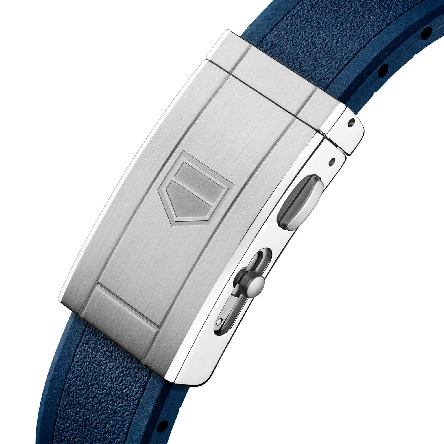 Close-up of a silver metal deployment clasp with engraved logo on a textured blue strap, inspired by deep-sea exploration and the iconic TAG Heuer Aquaracer Professional 300 Date.