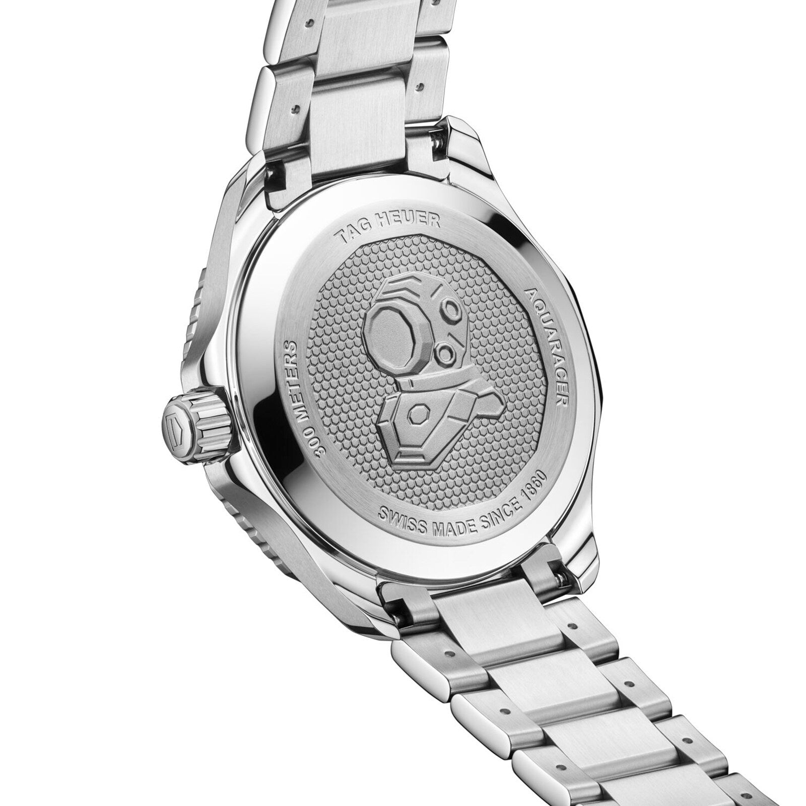 Close-up of the TAG Heuer Aquaracer Professional 300 GMT’s caseback, showcasing engraved details, hexagonal pattern, and its iconic metal bracelet—a refined timepiece from the TAG Heuer Aquaracer collection.