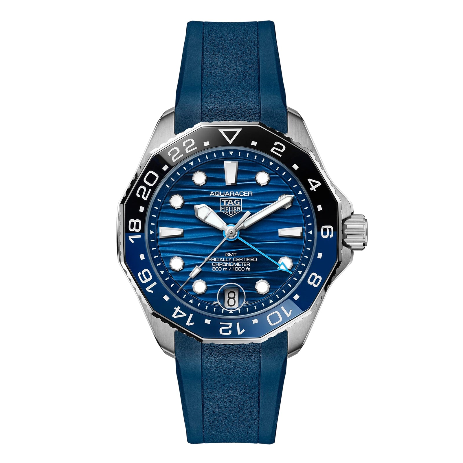 The TAG Heuer Aquaracer Professional 300 GMT is a luxury stainless steel watch with automatic movement, blue wave-patterned dial, blue bezel, rubber strap, date display, and GMT markings.