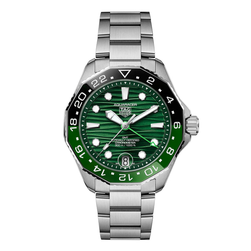 The TAG Heuer Aquaracer Professional 300 GMT features a stainless steel case and bracelet, green bezel and dial, silver hour markers, and a date display at 6 o’clock.