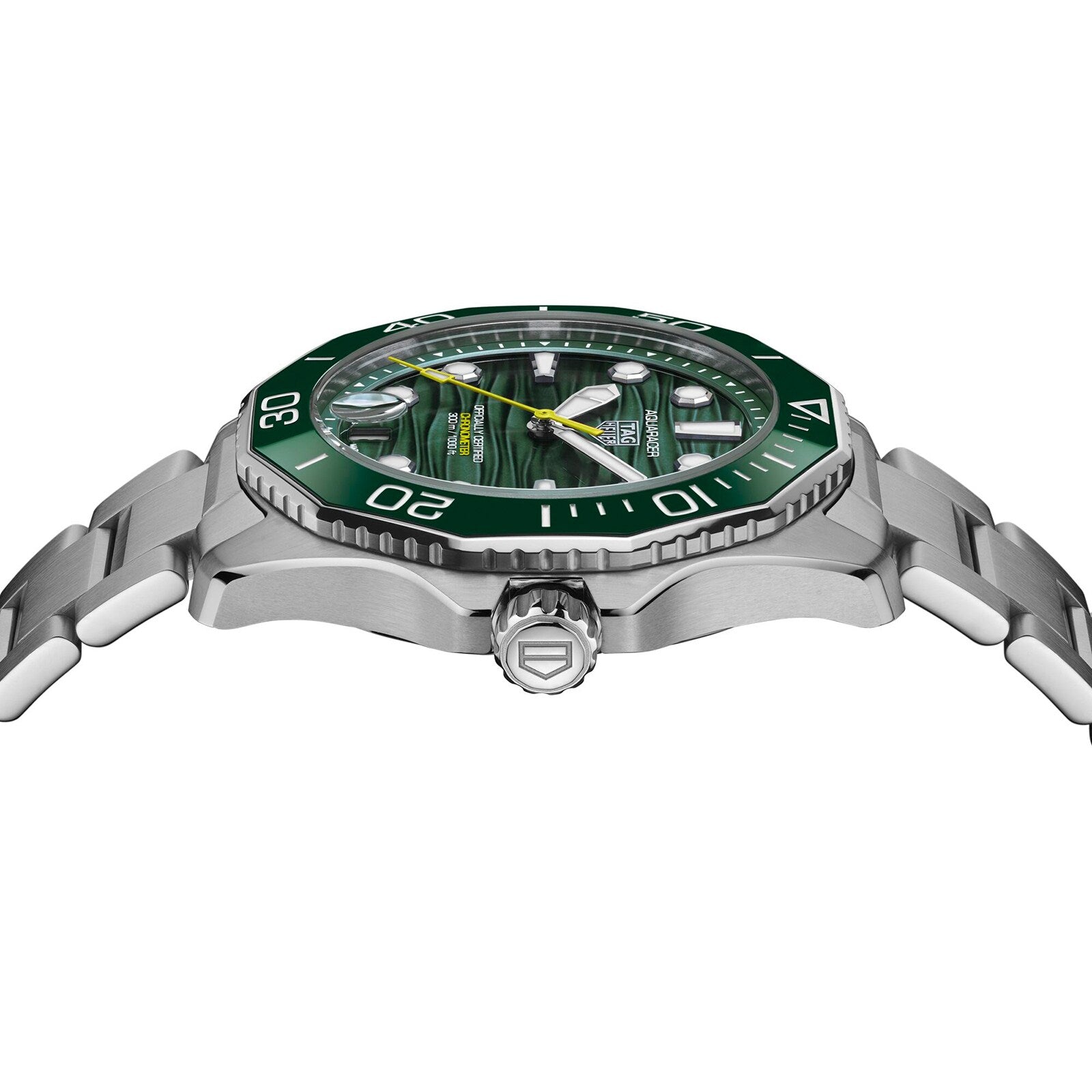A TAG Heuer Aquaracer Professional 300 Date wristwatch with a green ceramic bezel and dial, shown from the side to highlight its stainless steel bracelet and engraved crown.