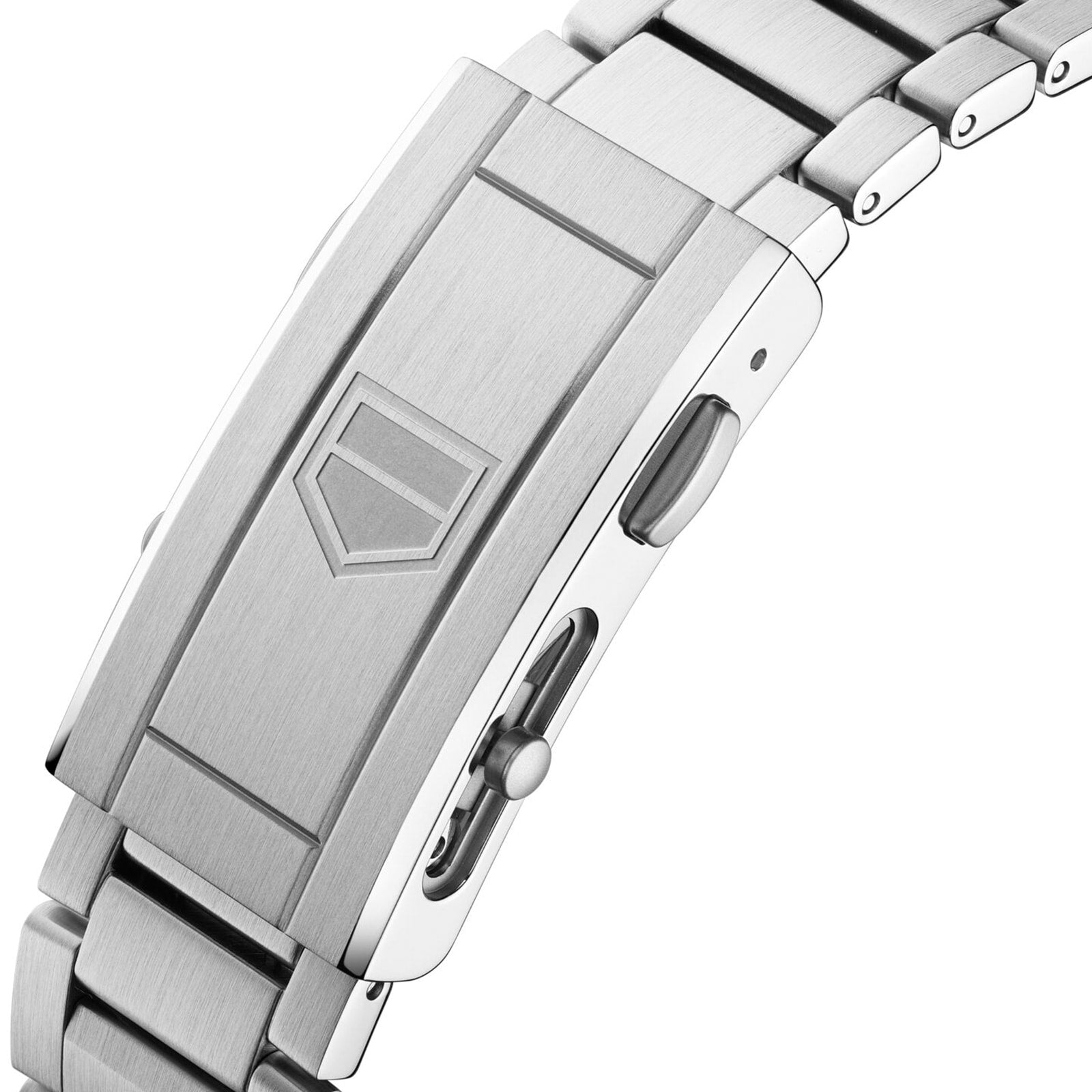 Close-up of a TAG Heuer Aquaracer Professional 300 Date stainless steel bracelet clasp, displaying an engraved geometric logo and visible side push buttons.