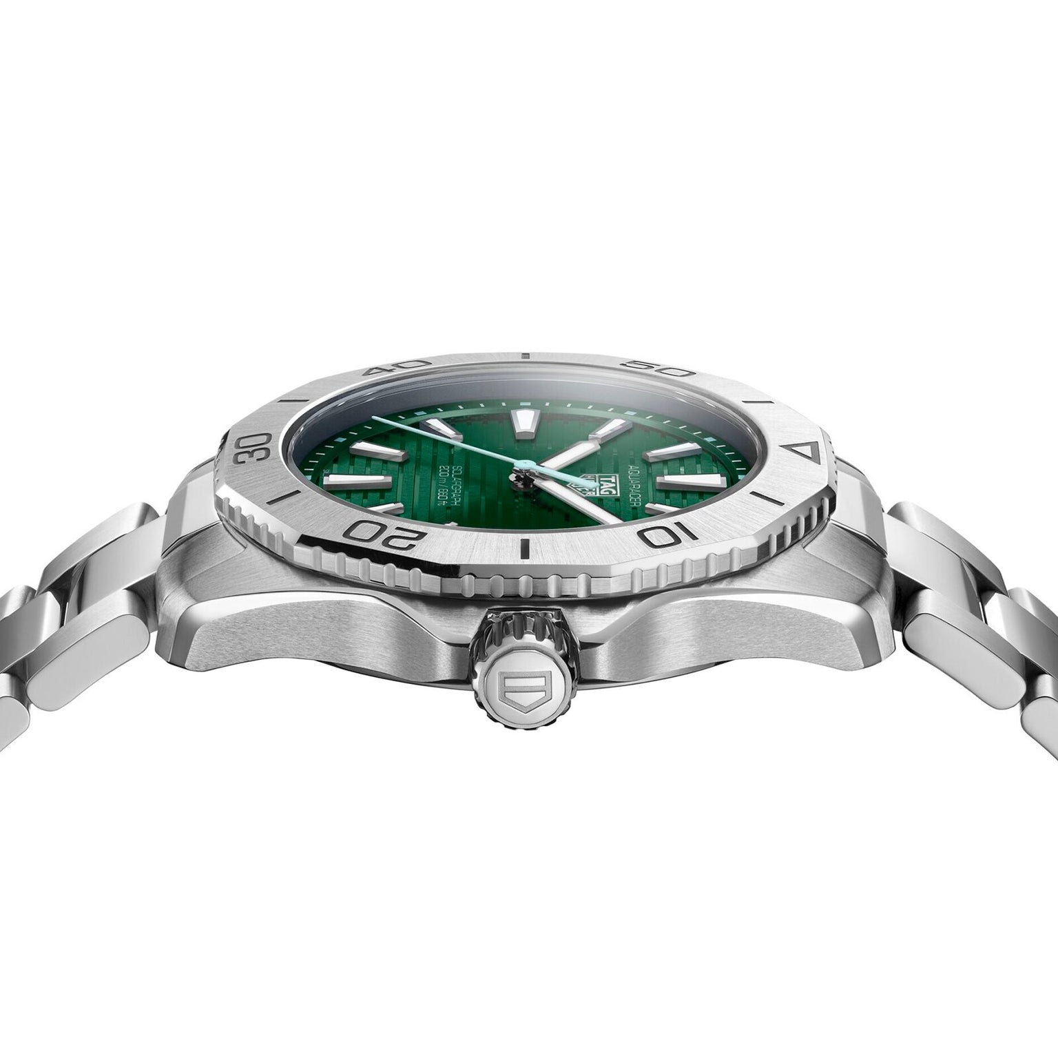 A side view of the TAG Heuer Aquaracer Professional 200 Solargraph wristwatch with a green dial, silver unidirectional bezel, screw-down crown, and metal link bracelet.