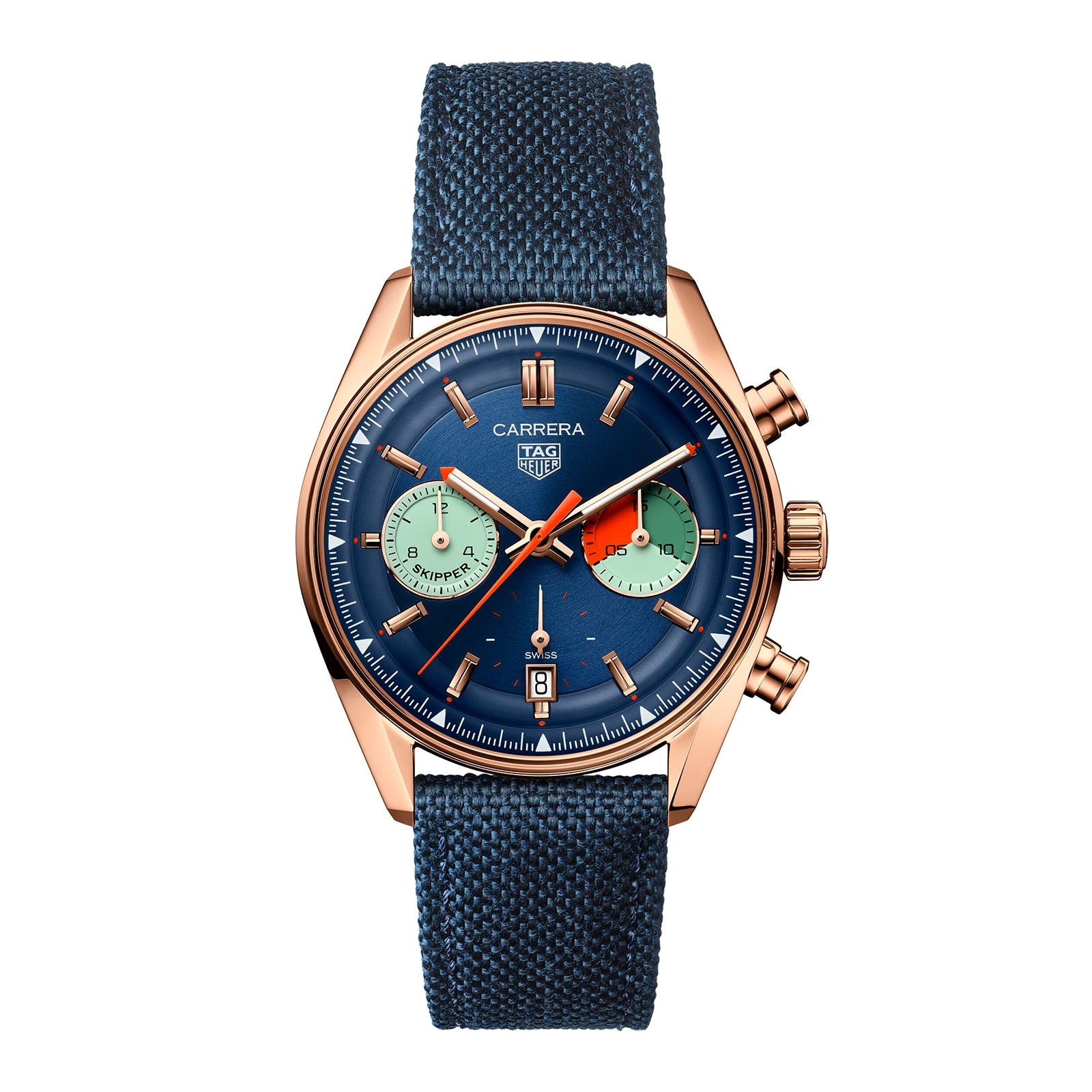 The TAG Heuer Carrera Chronograph Skipper features a gold case, blue textured strap, blue dial with two green subdials, orange chronograph hand, chronograph movement, and a date display at 6 o’clock.