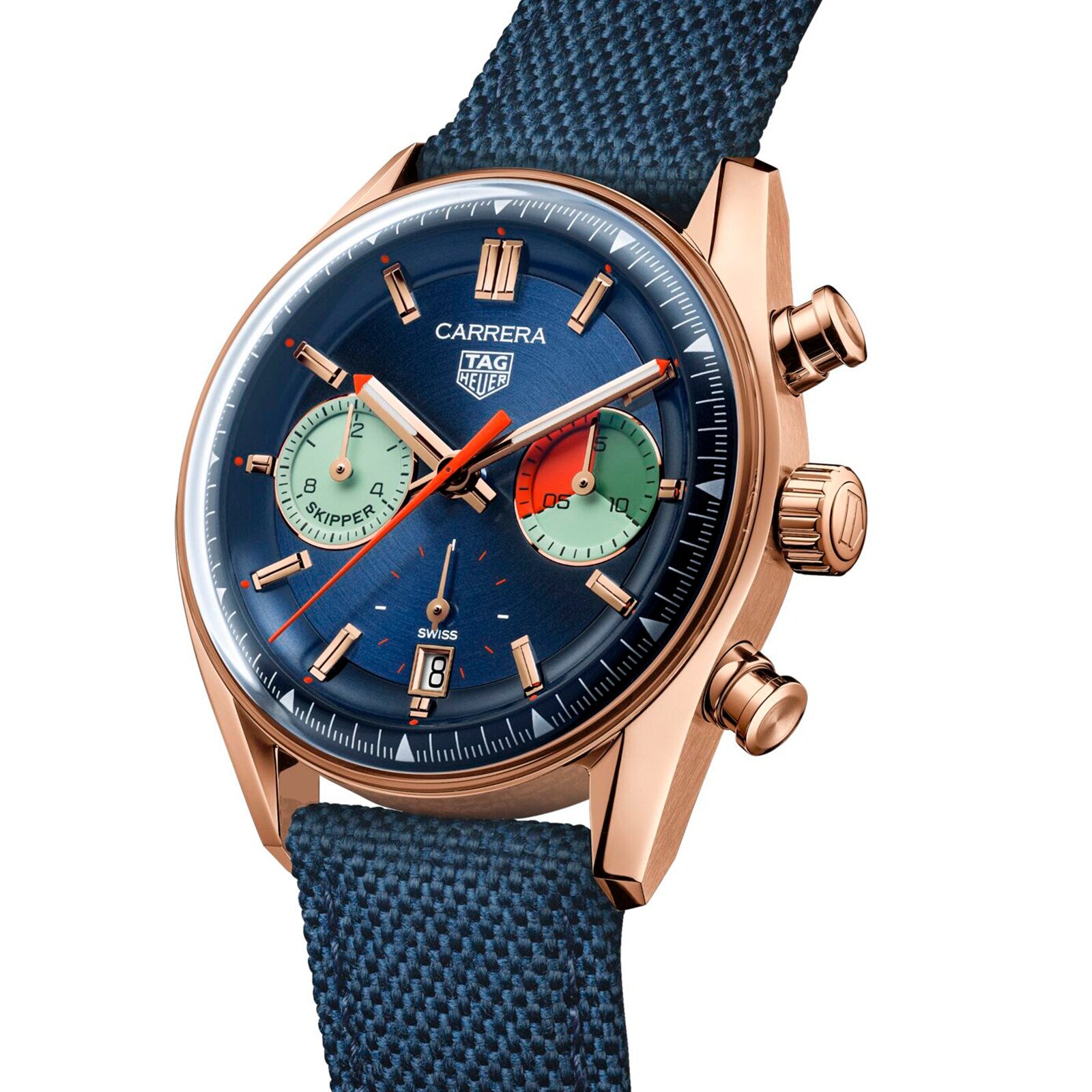 The TAG Heuer Carrera Chronograph Skipper features a rose gold case, blue dial, chronograph movement, two subdials, a date window at 6 o’clock, and a blue textured strap.