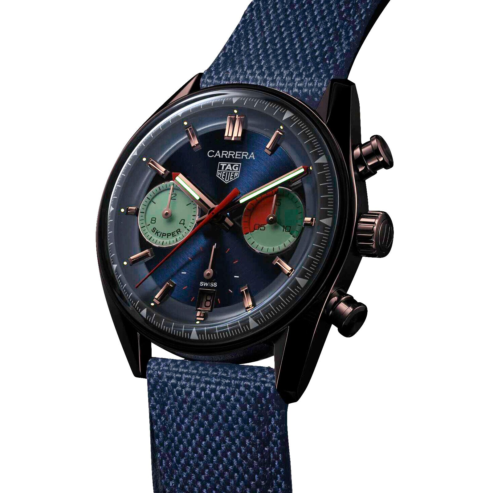 The TAG Heuer Carrera Chronograph Skipper features a blue face, green and red subdials, rose gold markers, and a textured blue strap.