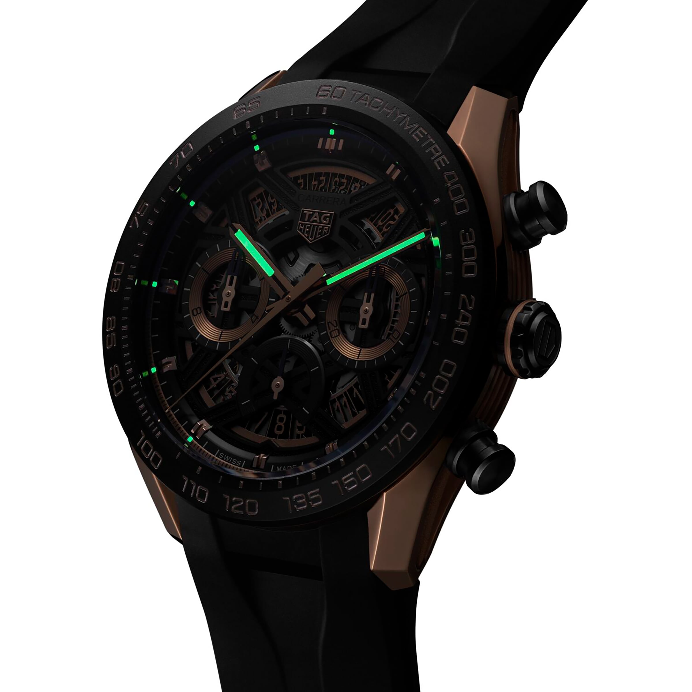 The TAG Heuer Carrera Chronograph Extreme Sport features a black and gold design, black strap, luminous green hands, and a tachymeter bezel—ideal for motorsport enthusiasts.