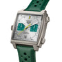 TAG Heuer Monaco Chronograph Racing Green features a square case, Racing Green and white dial, yellow second hand, Calibre 11 movement, date at 6 o’clock, and green perforated leather strap.