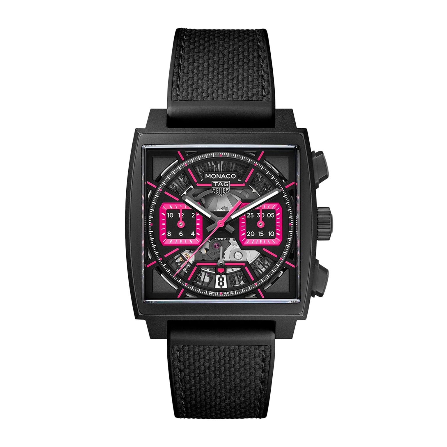 The TAG Heuer Monaco Chronograph features a square face, titanium case and strap, visible gears, and bold pink accents on the dial and sub-dials.