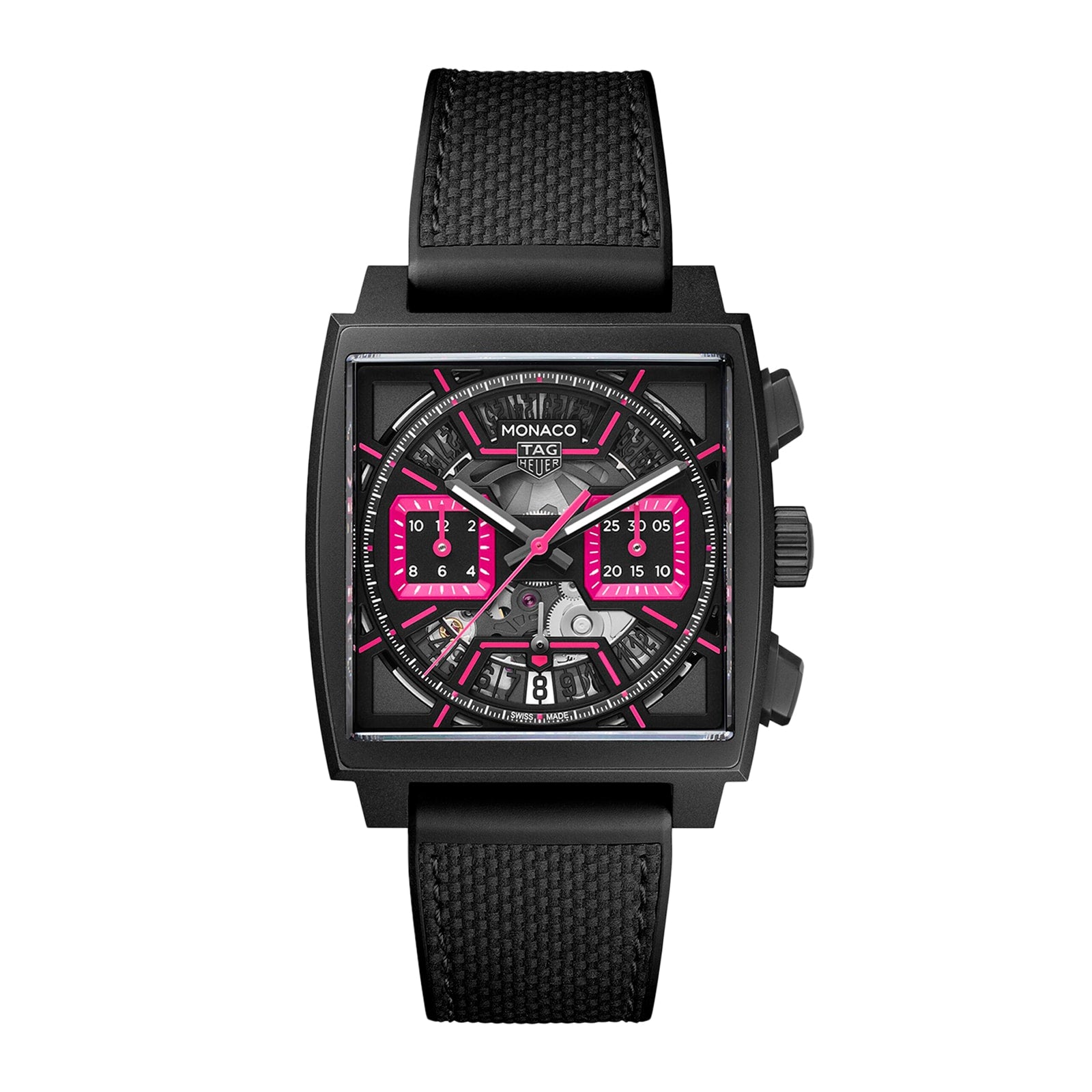 The TAG Heuer Monaco Chronograph features a square face, titanium case and strap, visible gears, and bold pink accents on the dial and sub-dials.