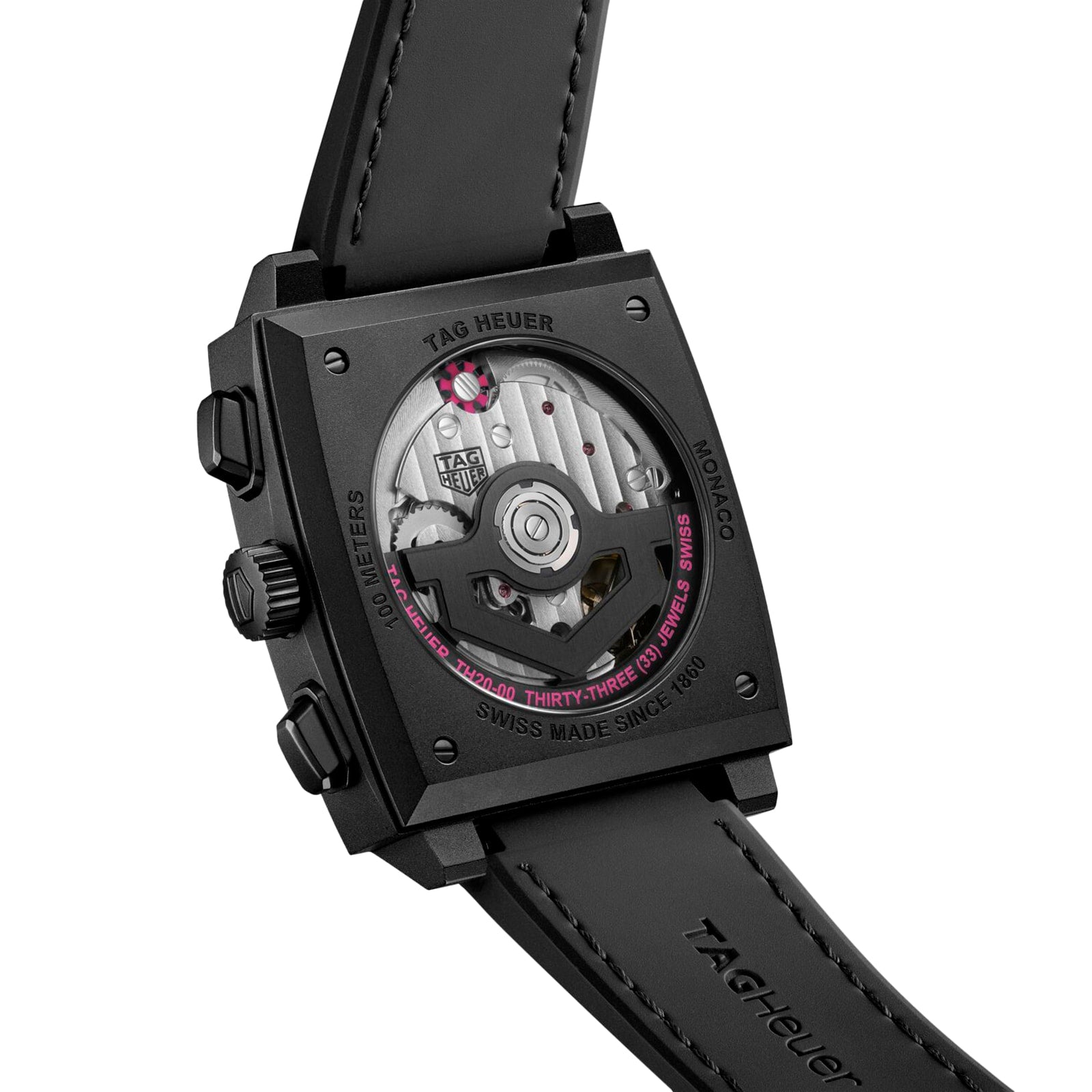 Back view of the TAG Heuer Monaco Chronograph, featuring a square titanium case, transparent caseback revealing the automatic movement, and paired with a black leather strap.