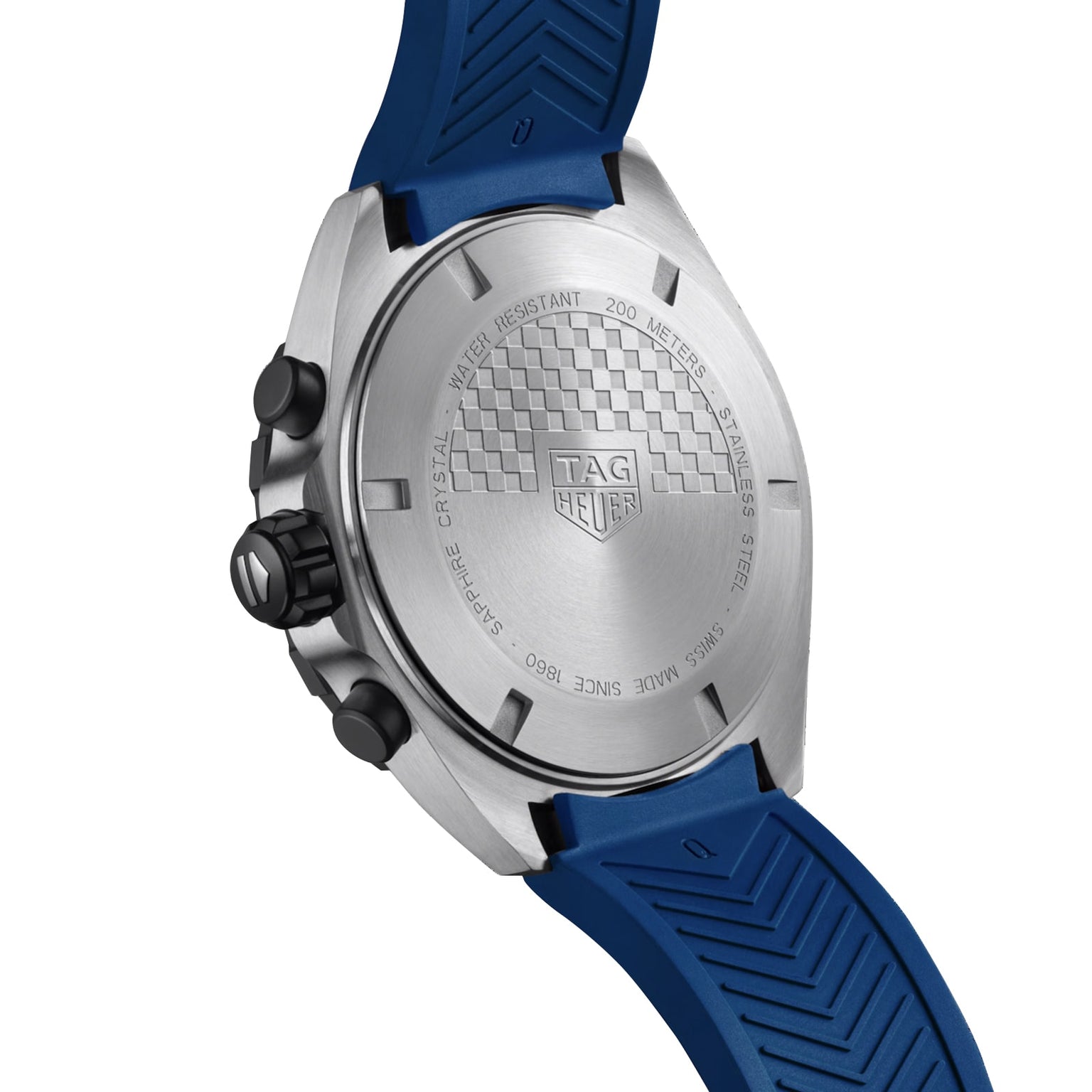 Close-up of the stainless steel caseback of a TAG Heuer Formula 1 Chronograph, featuring engraved logo, water resistance details, and other specifications. Blue rubber strap visible.