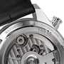 Close-up of the back of the TAG Heuer Carrera Tourbillon Centenary The Watches of Switzerland Group Exclusive, highlighting engraved branding and part of the visible mechanical movement.
