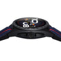 A close-up side view of the TAG Heuer Special Edition Connected Calibre E4 x Oracle Red Bull Racing features large white numerals and a motorcycle racer on its black dial, paired with a blue strap accented in red.