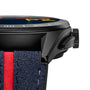 Close-up of the TAG Heuer Special Edition Connected Calibre E4 x Oracle Red Bull Racing: black case, textured crown, and blue leather strap with red stripe—ideal for racing-inspired watch faces.