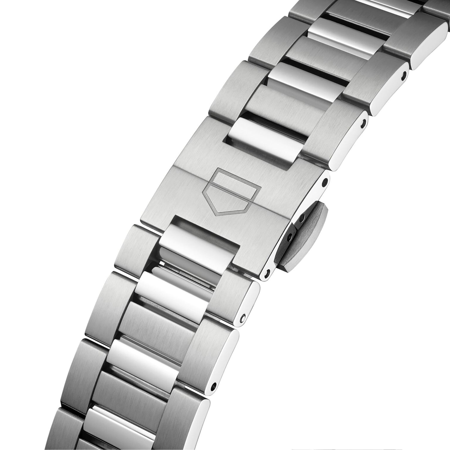 Close-up of the TAG Heuer Carrera Date’s stainless steel bracelet with a brushed clasp and engraved shield logo, set against a plain white background.