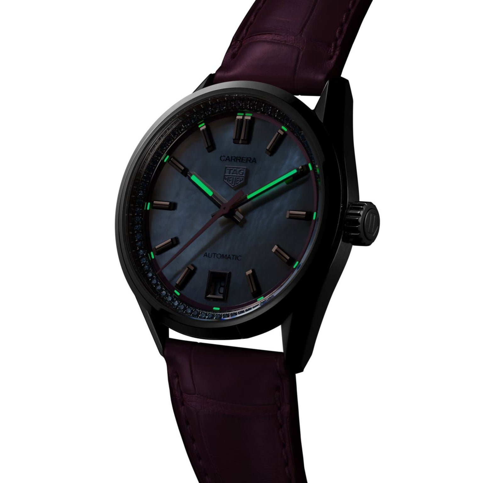 A TAG Heuer Carrera Calibre 7 watch with a dark mother-of-pearl dial, green luminescent hands, rose gold-plated indexes, date display, and a burgundy leather strap is shown at an angle.