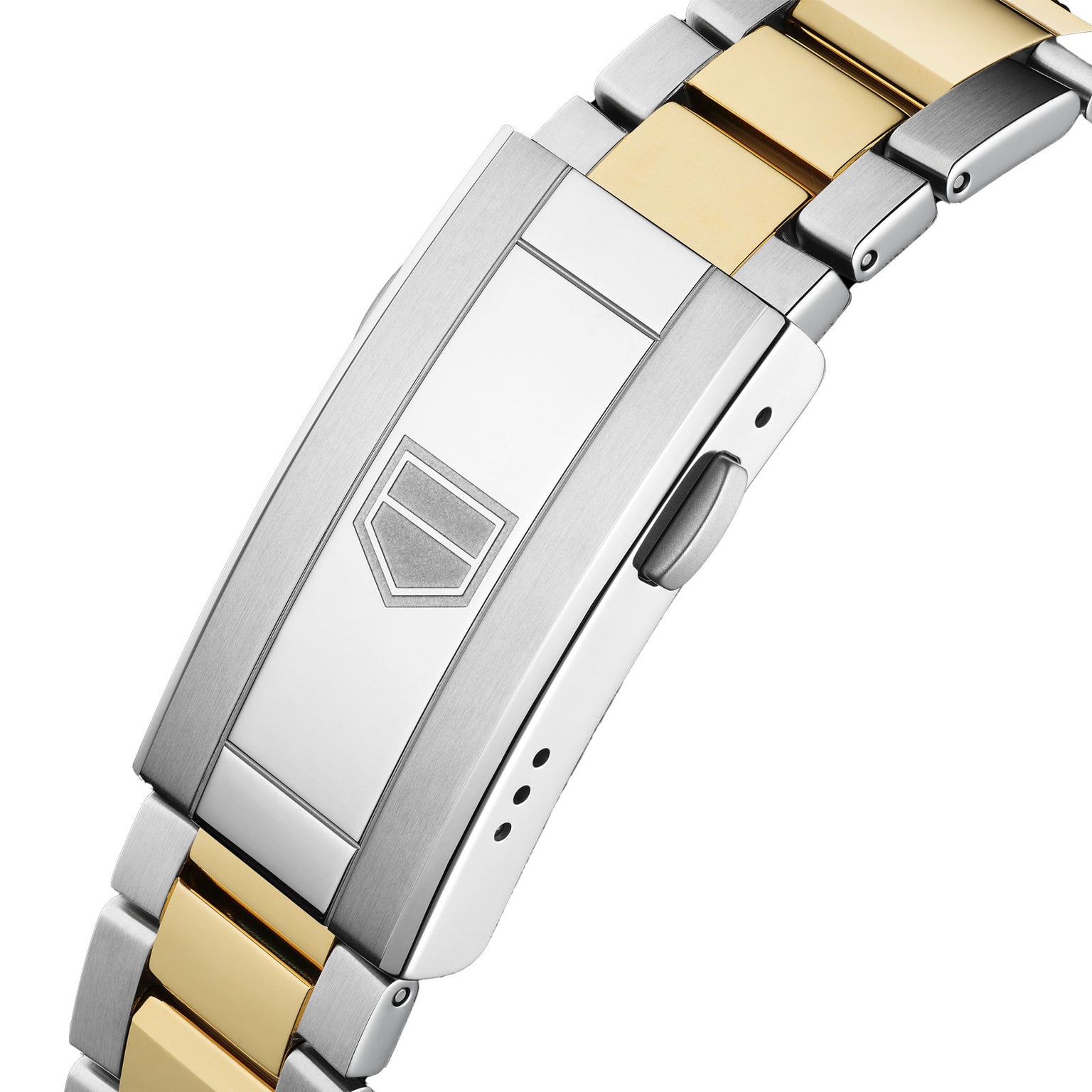 Close-up of a TAG Heuer Aquaracer Professional 200 Solargraph’s two-tone bracelet with silver and gold links, deployment clasp, and engraved shield logo.