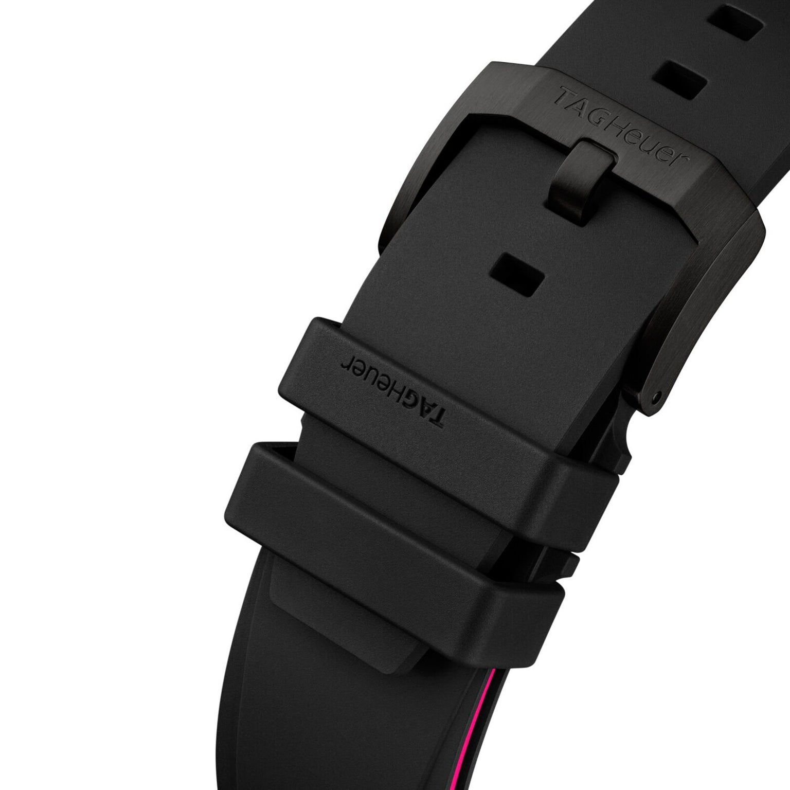 Close-up of a black rubber strap for the TAG Heuer Formula 1 Chronograph Limited Edition, featuring a matte black buckle and two loops. Both the strap and buckle display the TAG Heuer logo, highlighting its sporty motorsports-inspired design.