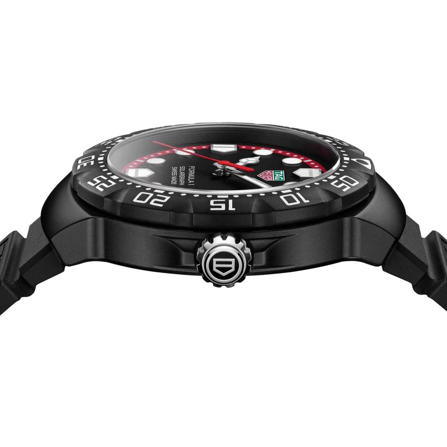 A TAG Heuer Formula 1 Solargraph wristwatch with a black round face, red accents, and a black rubber strap, shown from the side.