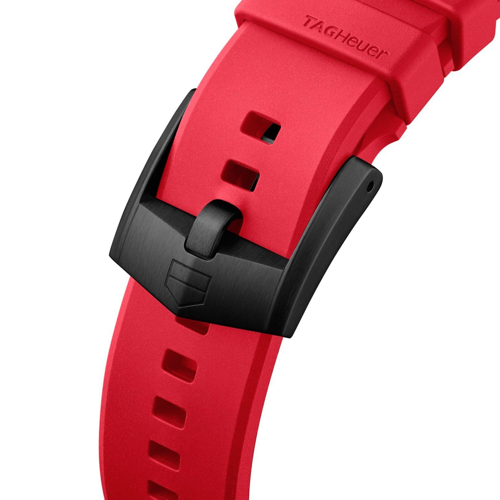Close-up of a red TAG Heuer Formula 1 Solargraph watch strap with a black buckle.