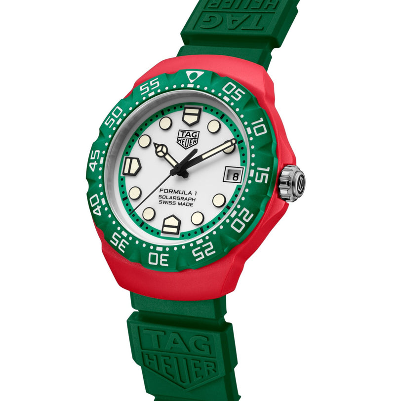 TAG Heuer Formula 1 Solargraph watch with a red and green bezel, white dial, and green rubber strap.