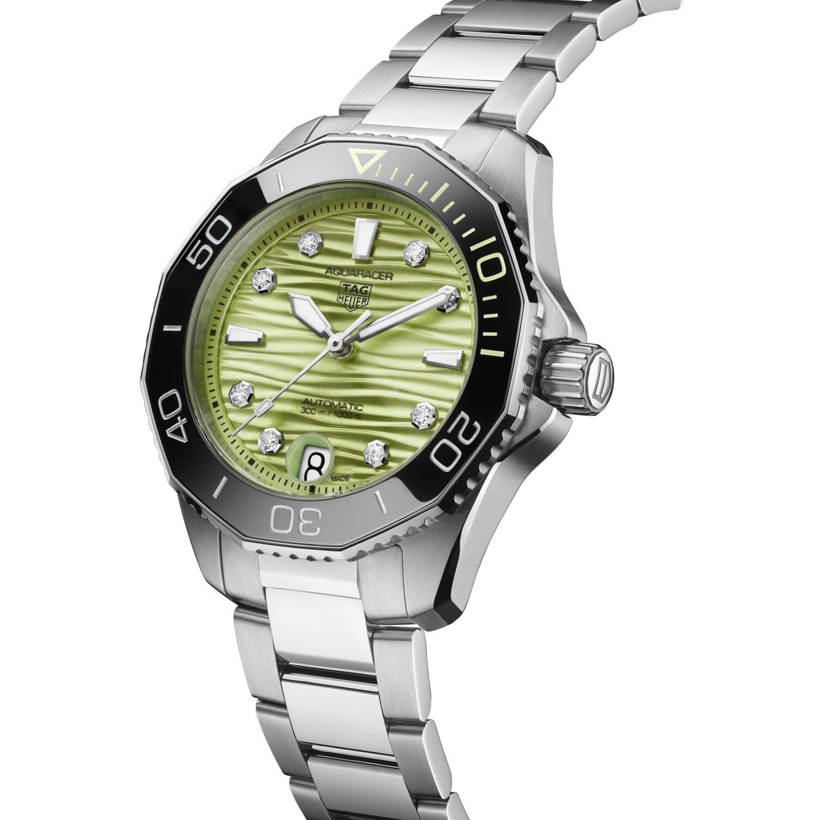 The TAG Heuer L SS AU BW AQUAR 300 36 GRN DD DL 25 is a silver stainless steel wristwatch with a green textured dial and diamond hour markers.