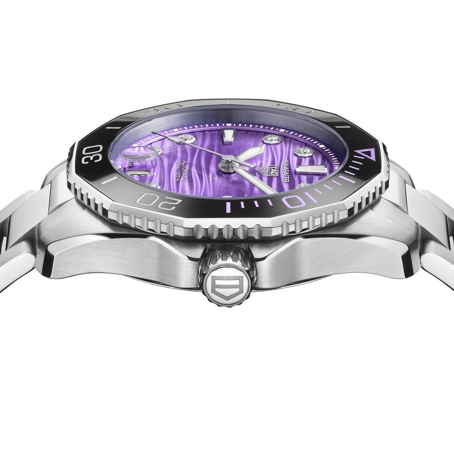 TAG Heuer L SS AU BW AQUAR 300 36 PURP DD DL 25: Silver wristwatch with a purple dial, black bezel, and metal bracelet, shown from the side.