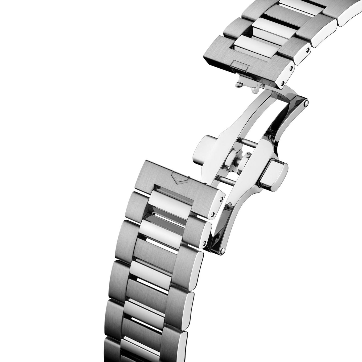 The TAG Heuer Carrera Date Twin-Time features a stainless steel bracelet with an open deployment clasp, showcasing intricate mechanism details.